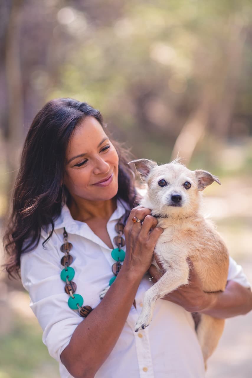 Dr. Danielle Chapman with a dog in the park